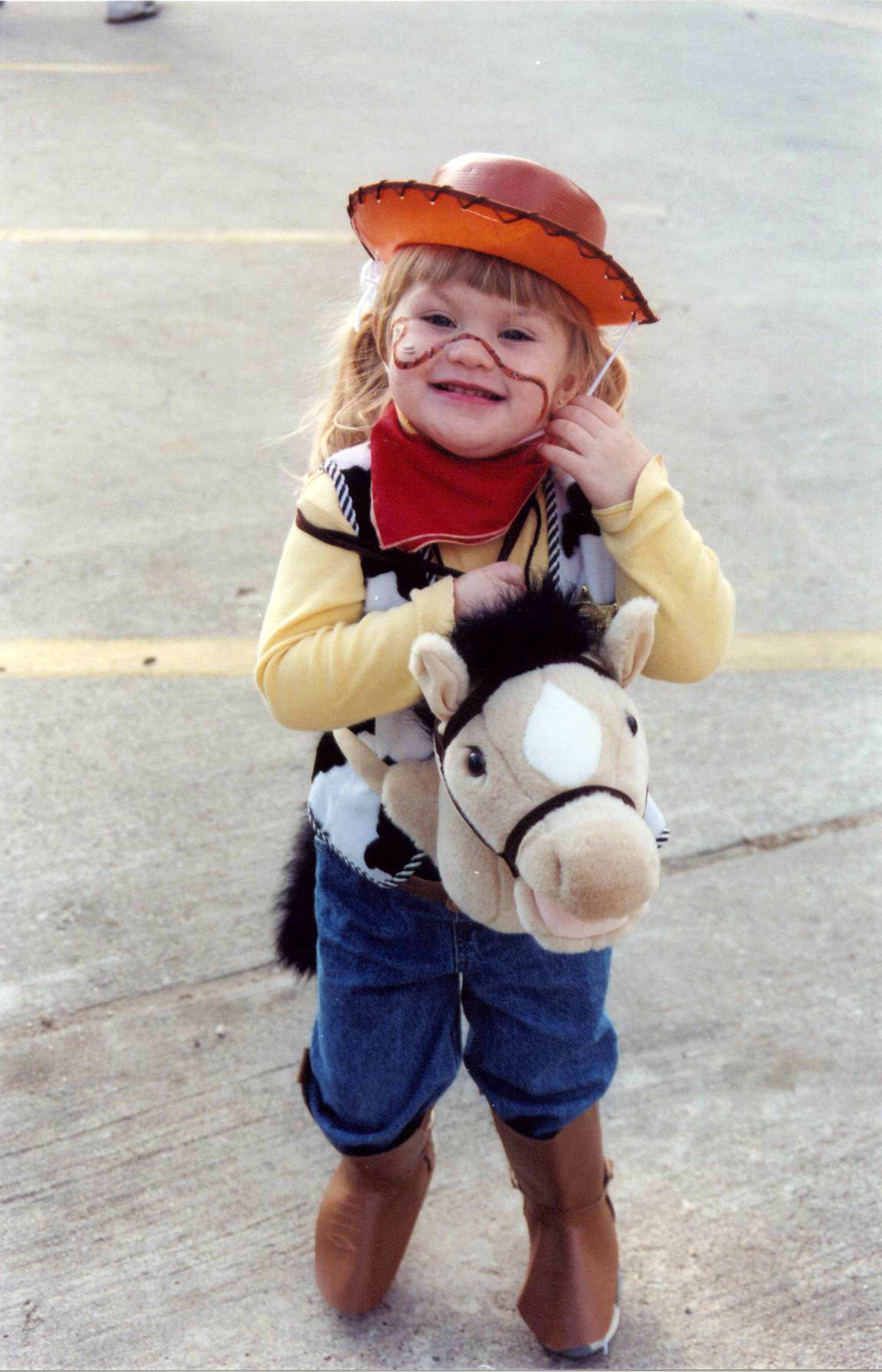 Child dressed up as cowboy