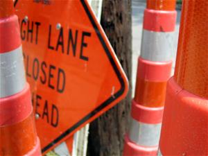 Right Lane Closed Ahead sign and cones
