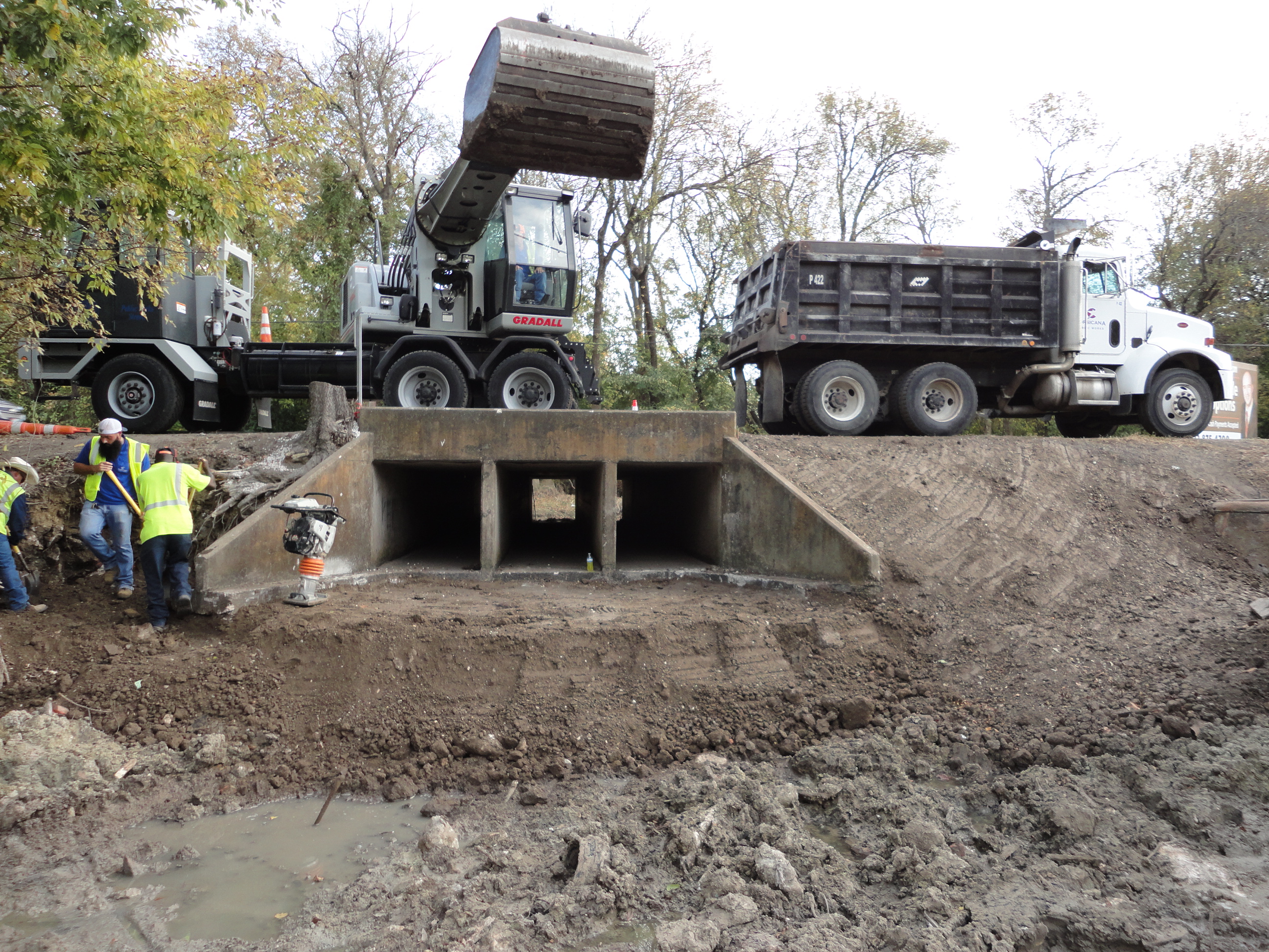 City crew working on large drain